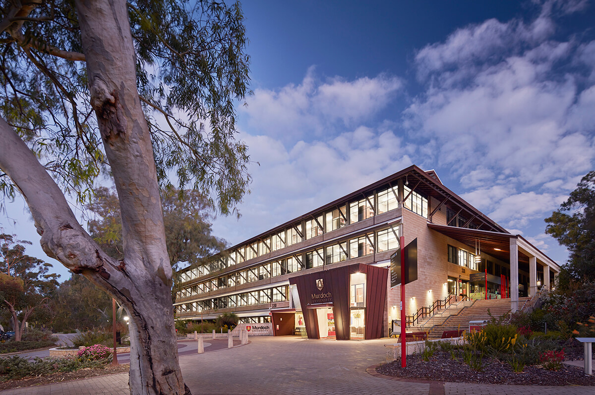A multi-storey university campus with exterior cladding and windows that require a high-rise cleaning service.