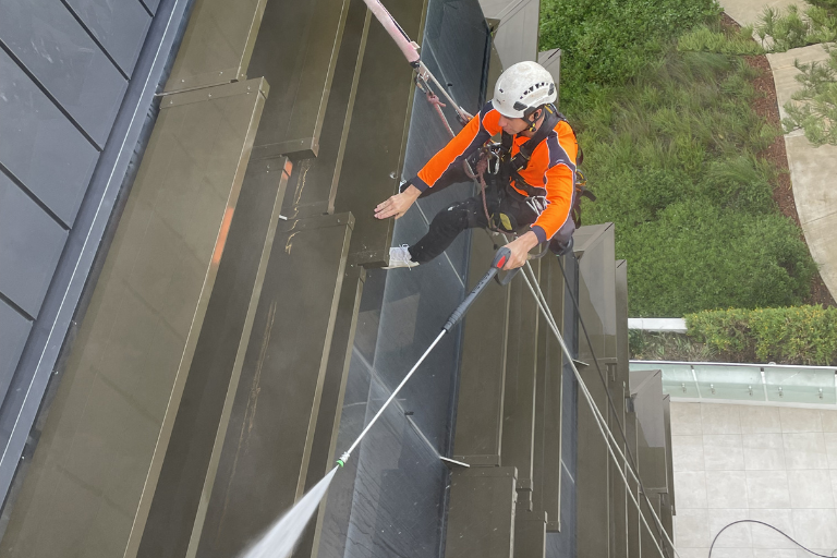 A multi-storey shopping complex requiring high-rise window cleaning.